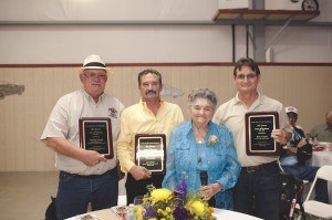 Phillip, Ken, Lilia Curti Giacomazzi, & Ben Curti were honored for their work.